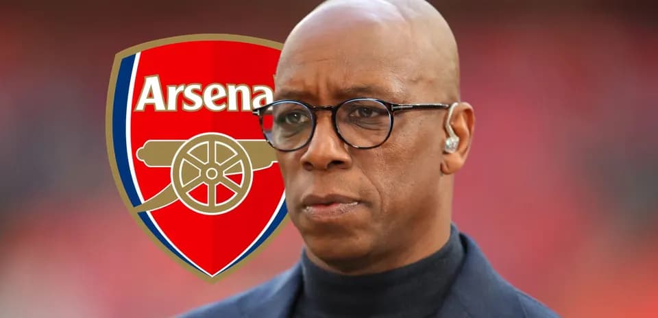Person wearing glasses with Arsenal logo background