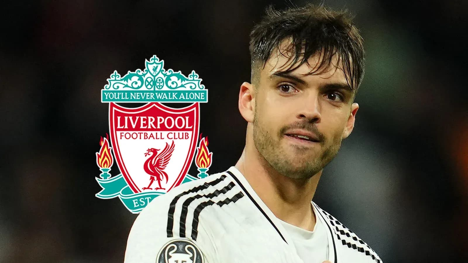 Futbolchi Liverpool logosi oldida o'zini tutmoqda