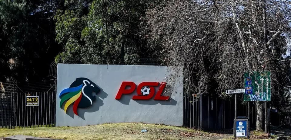 PSL logo on wall with street signs nearby