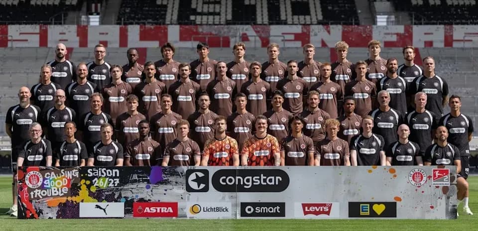 St. Pauli team photo with sponsors at stadium