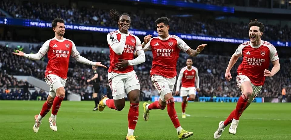 Arsenal players celebrating a goal during match