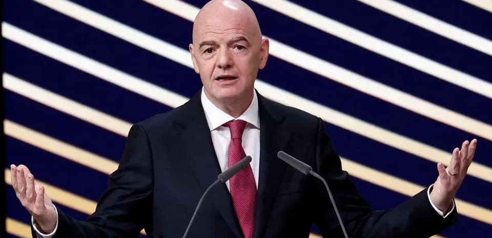 FIFA president speaking at press conference podium