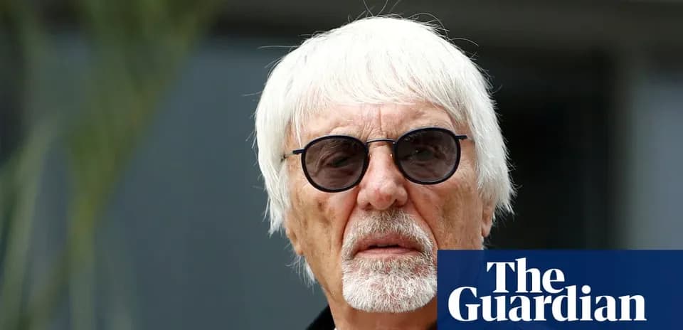 Man with white hair and sunglasses outdoors