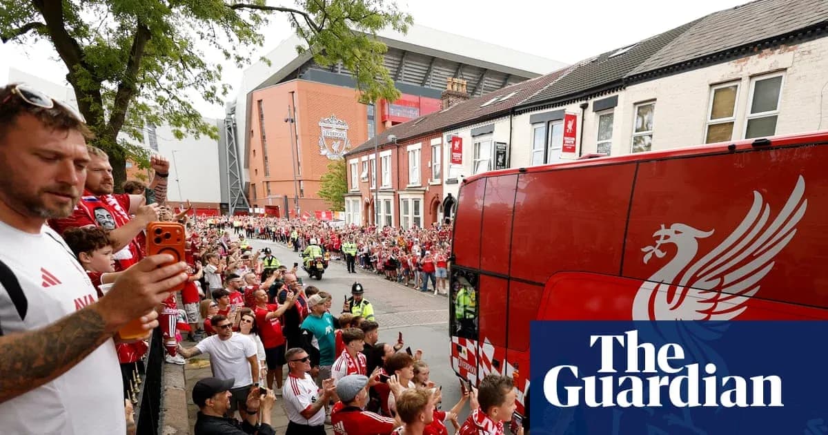 Liverpool fans gathered to welcome team bus arrival