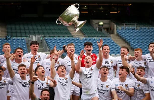 Jubilation as team celebrates winning trophy