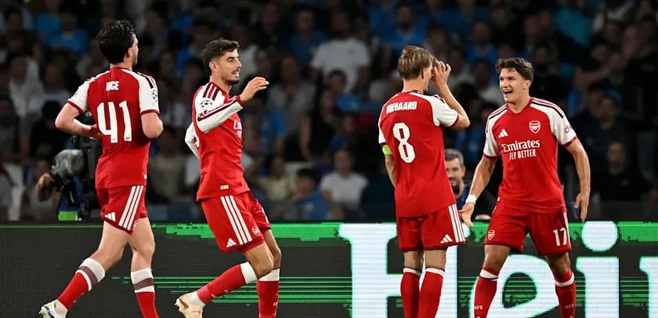Arsenal players celebrating during a match
