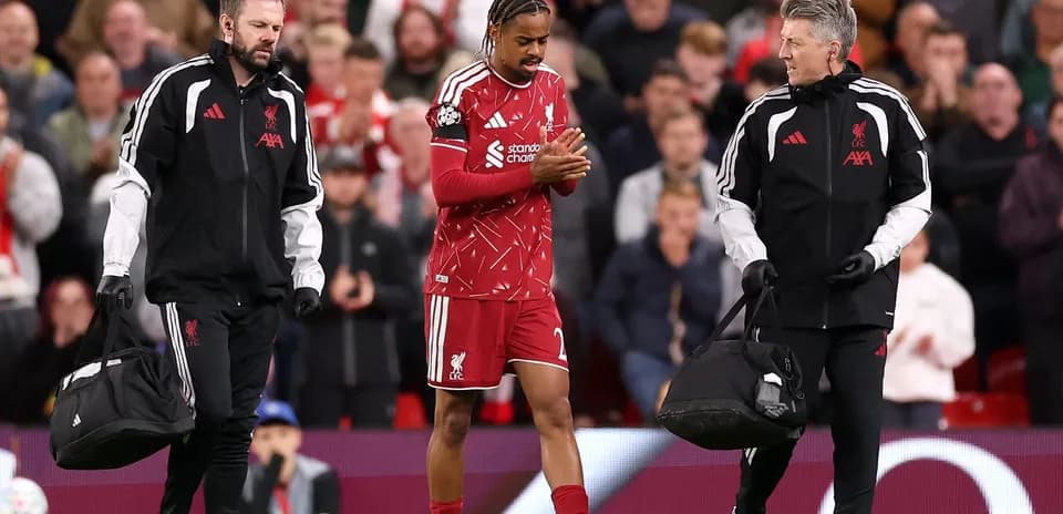 Liverpool player receiving medical attention off the field