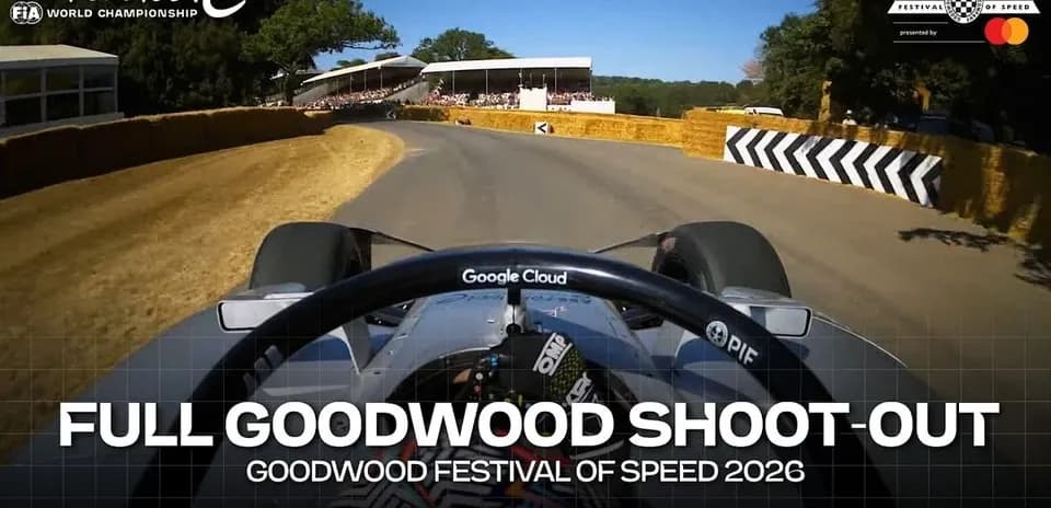 Formula E car navigating a curve at Goodwood