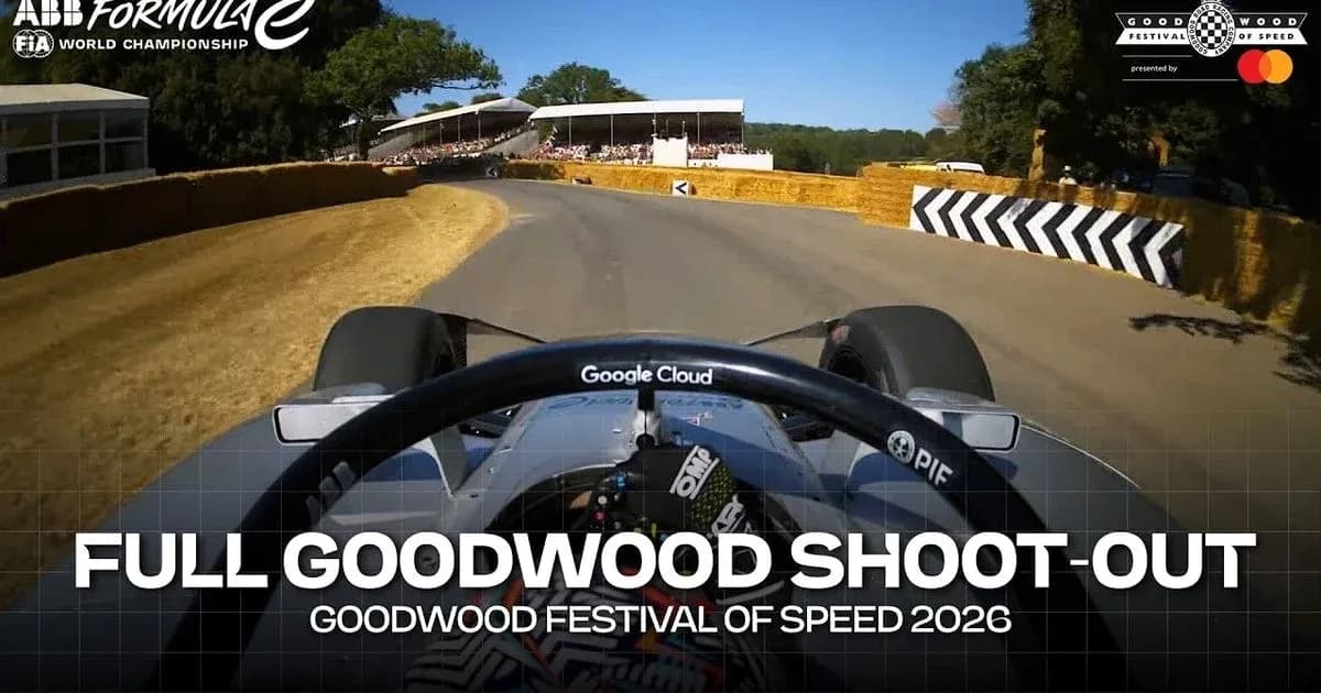 Formula E car navigating a curve at Goodwood