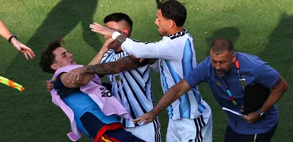 Players celebrating a goal during a match