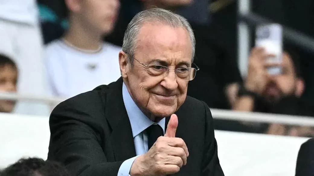 Man giving thumbs up in stadium stands
