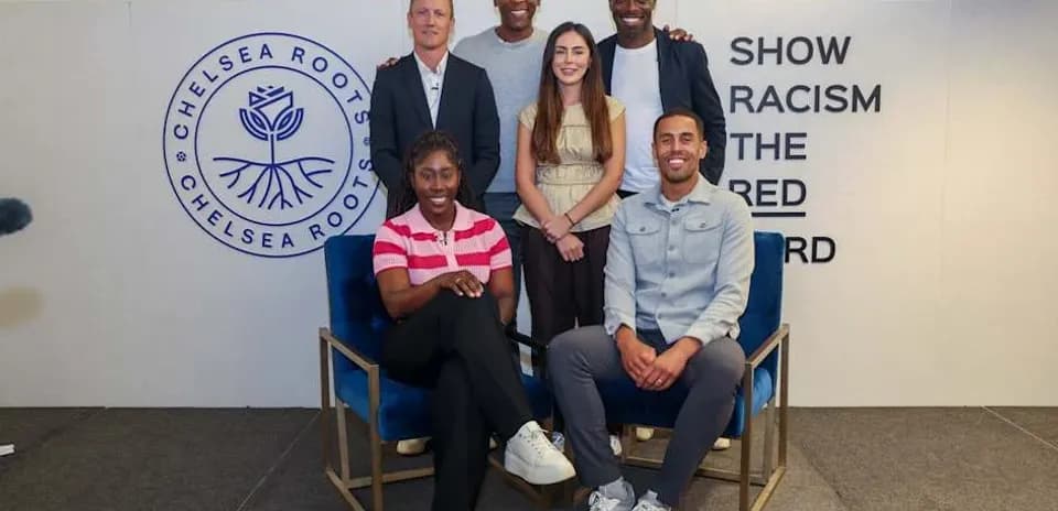 Group of six people promoting anti-racism campaign