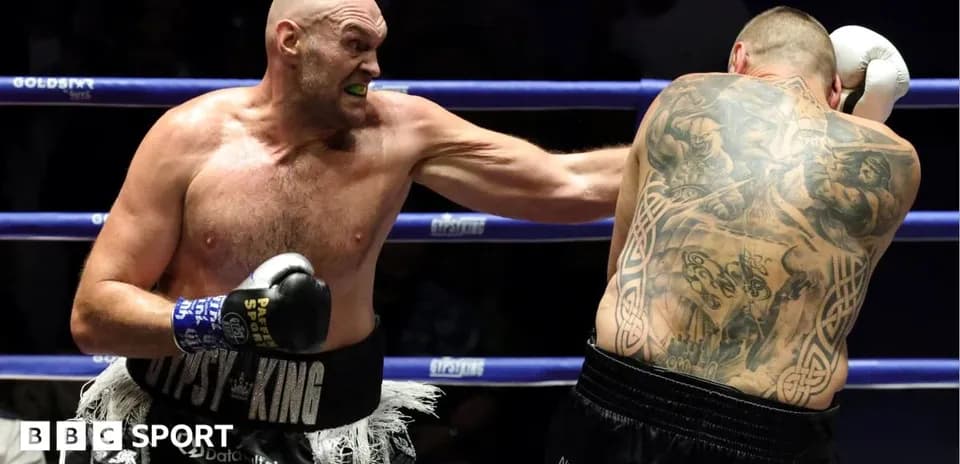 Boxer throwing a punch in the ring