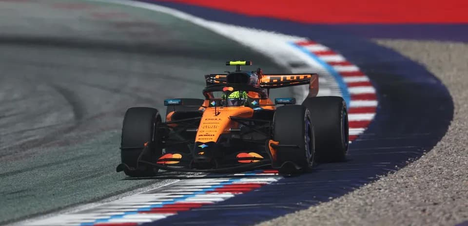 McLaren Formula 1 car navigating a track corner