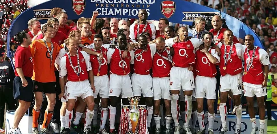 Arsenal players celebrating Barclays Premier League victory