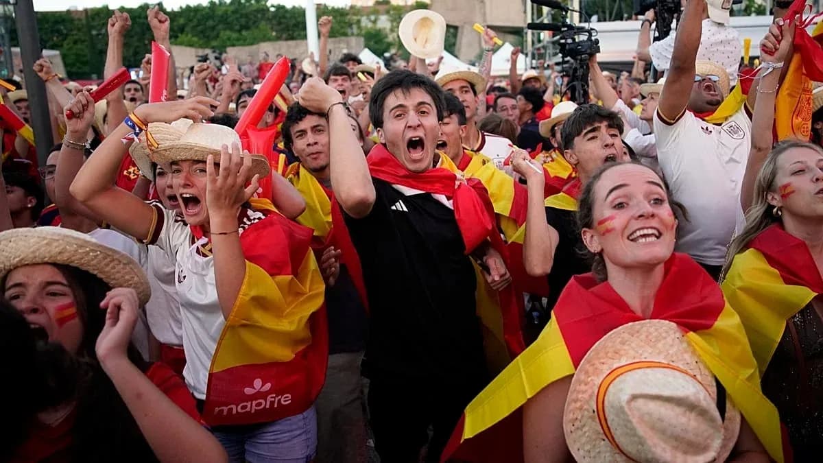 Fans celebrating with flags during a sports event