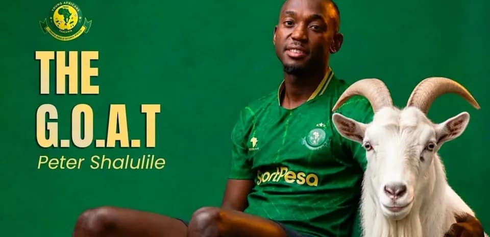 Peter Shalulile posing with a goat