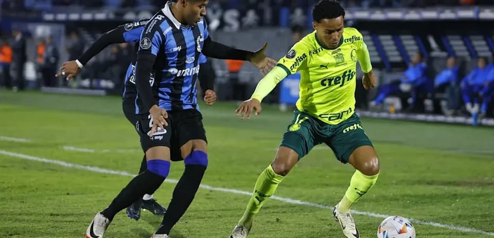 Two players competing for the ball during match