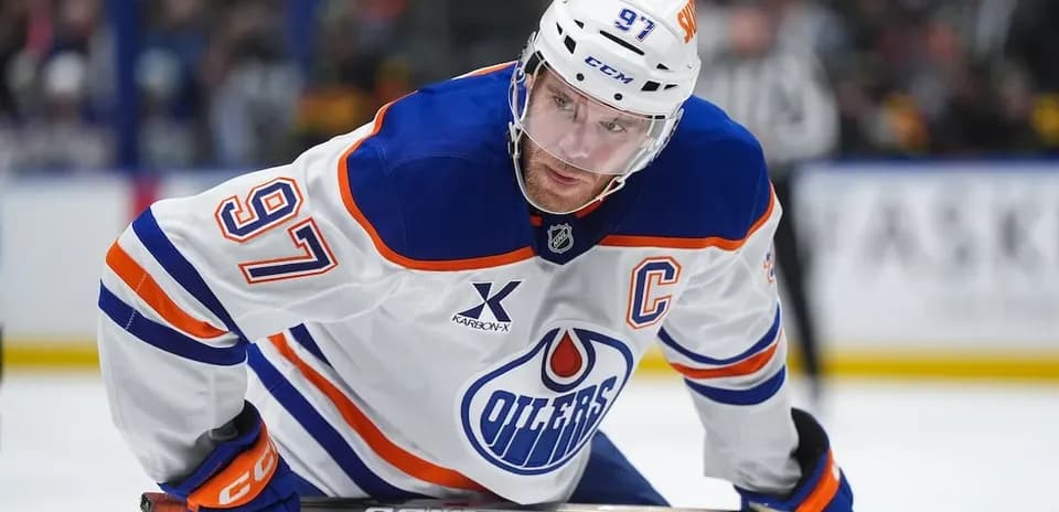 Hockey player in Edmonton Oilers uniform on ice