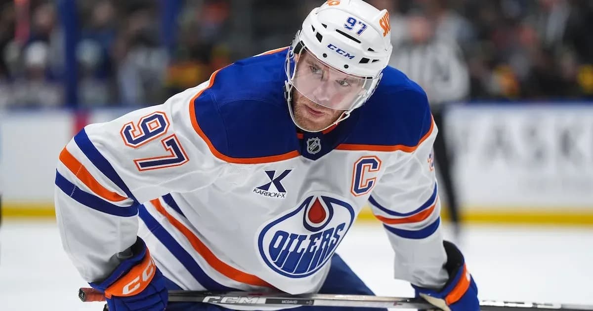 Hockey player in Edmonton Oilers uniform on ice