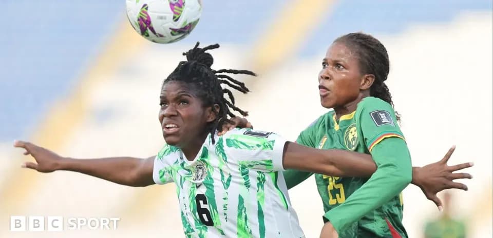Two players contesting a high ball during match
