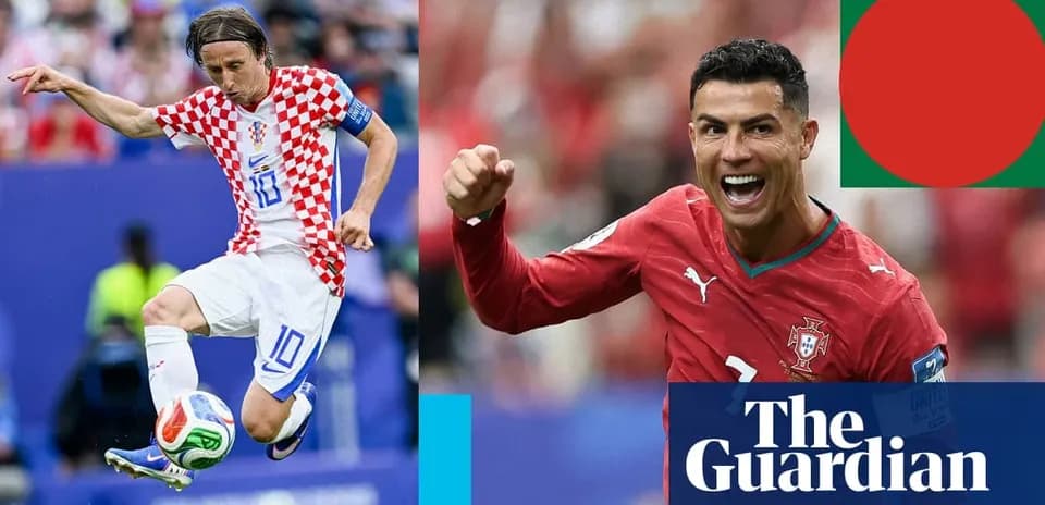 Luka Modric and Cristiano Ronaldo during football match