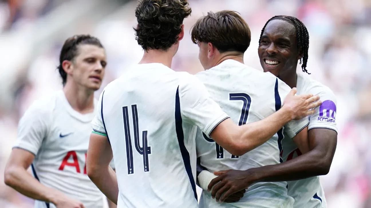 Tottenham players celebrating a goal together