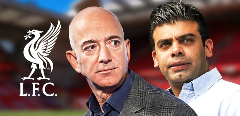 Jeff Bezos and another person at Liverpool FC backdrop