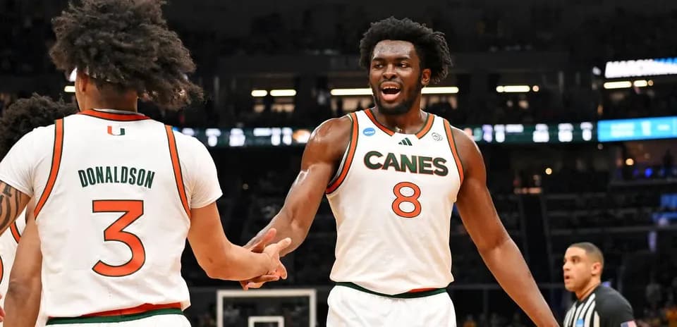 Miami players celebrating during a basketball game