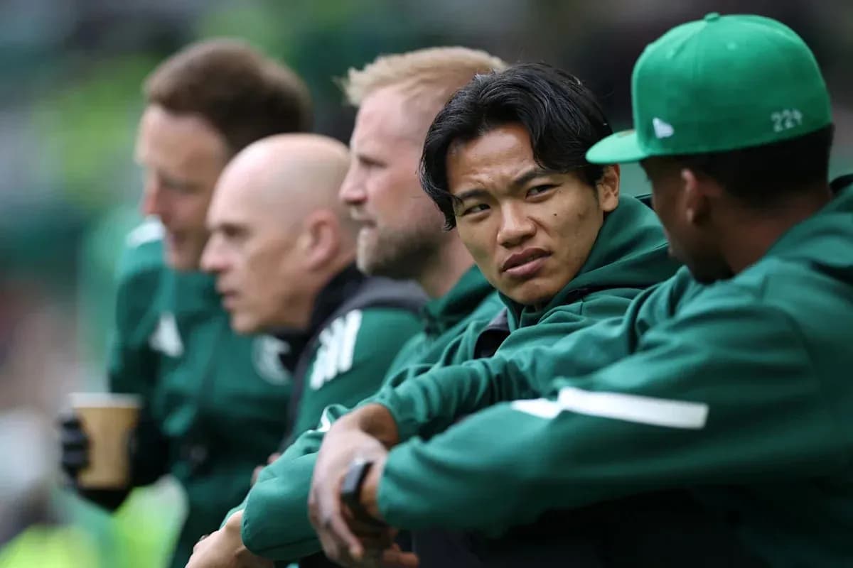 Players seated on bench during a match