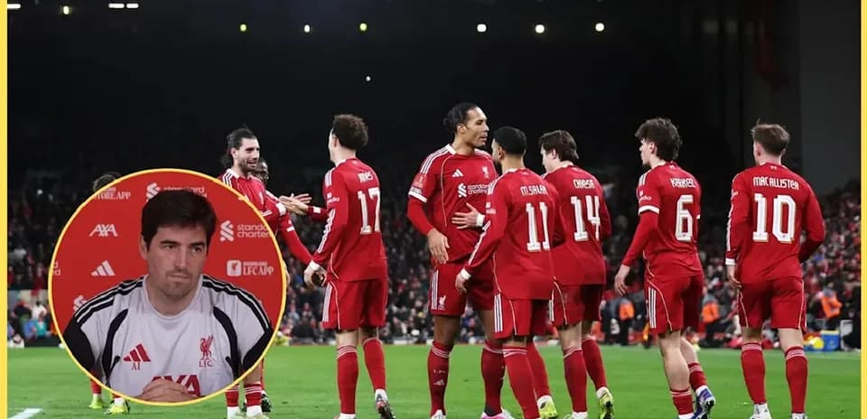 Liverpool players celebrating a goal on the pitch
