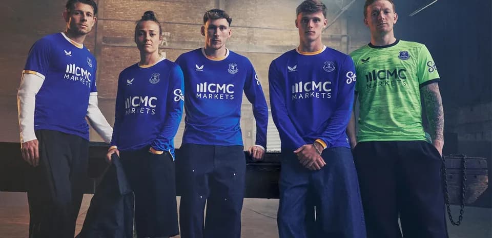 Everton players posing in new kit design