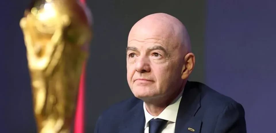 FIFA president with World Cup trophy at event