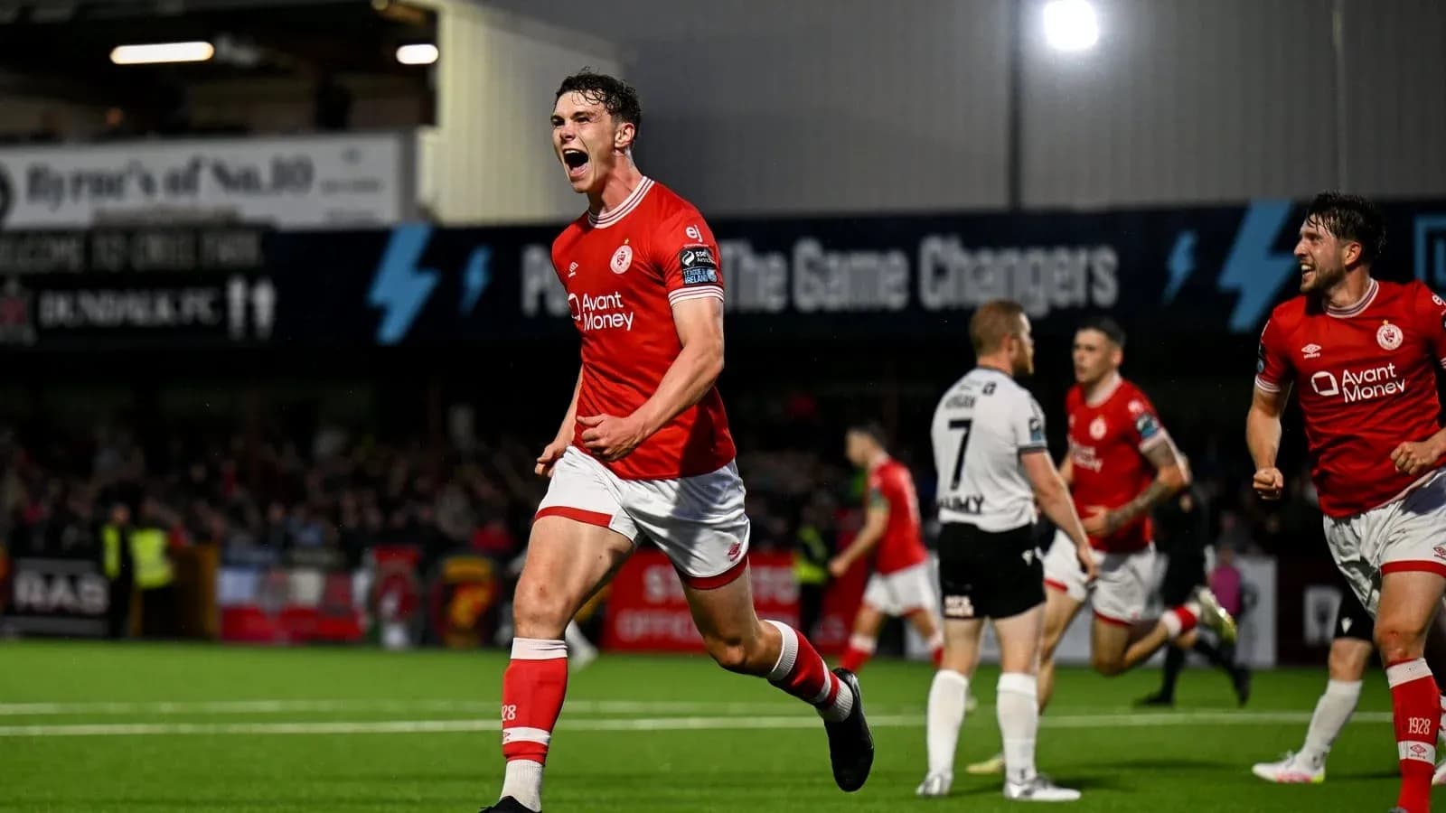 Player celebrating a goal during a football match