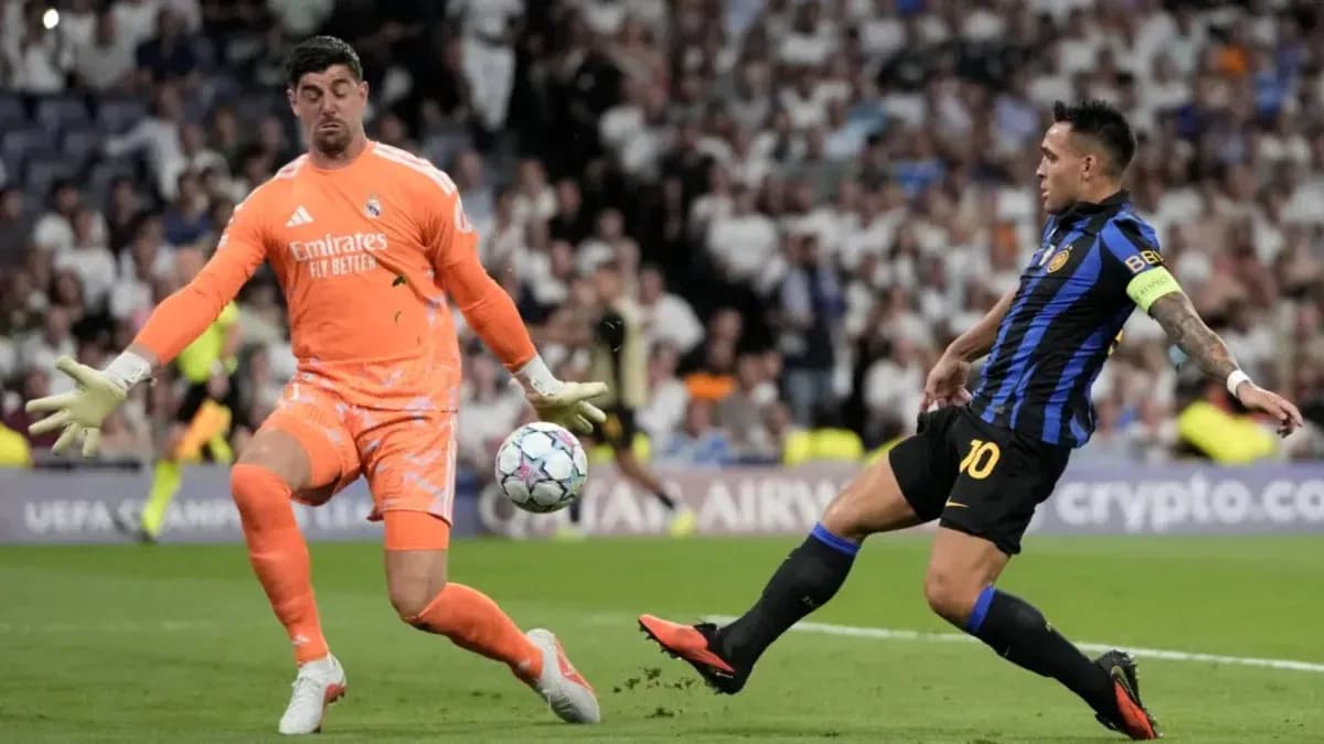 Goalkeeper attempting to save shot during match