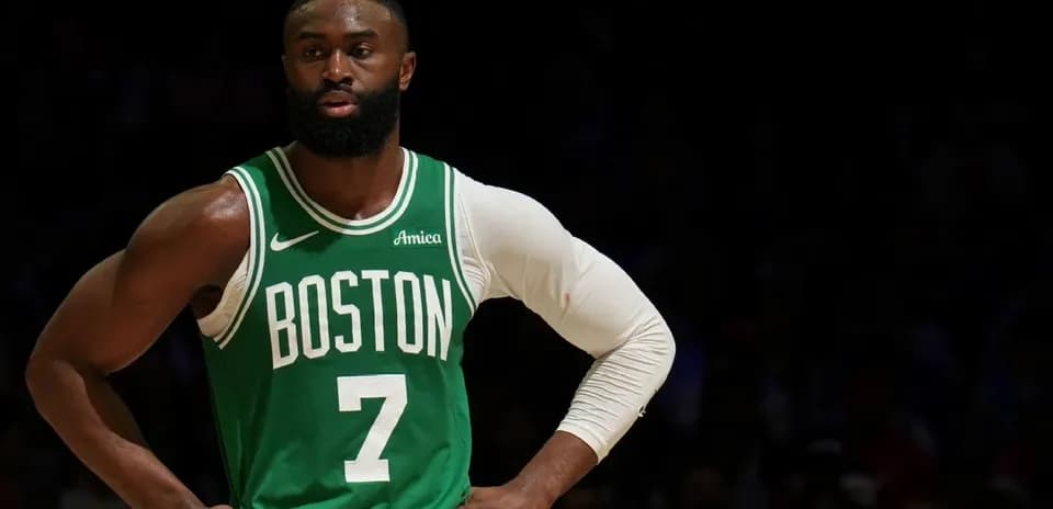 Basketball player in Boston Celtics uniform on court