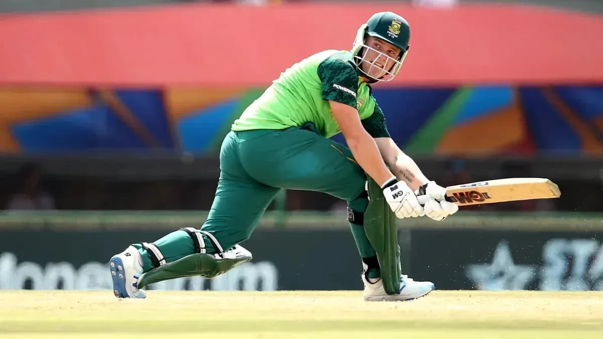 Batsman playing a shot on cricket field