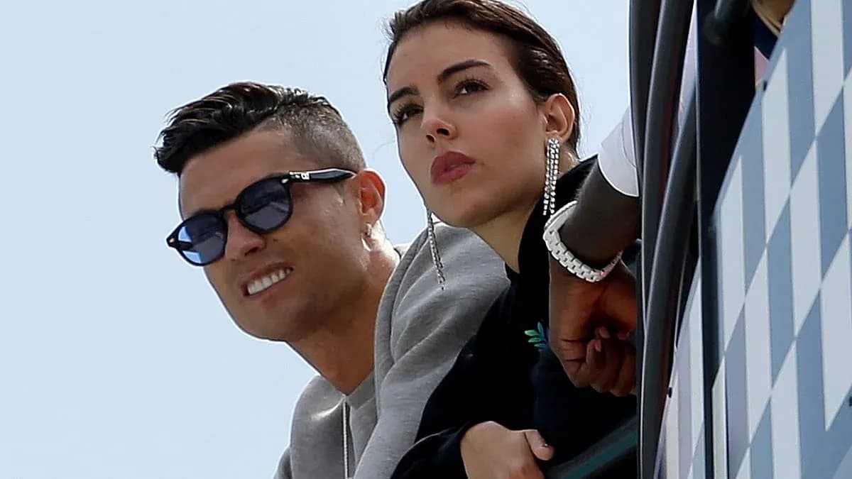 Couple watching from balcony during event