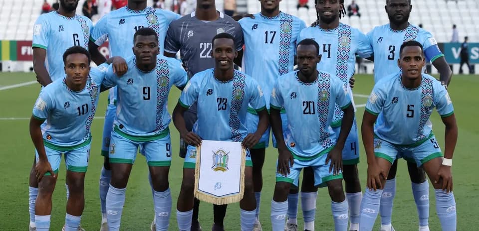 Football team posing for photo before the match