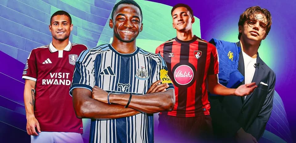 Four football players in team jerseys posing together