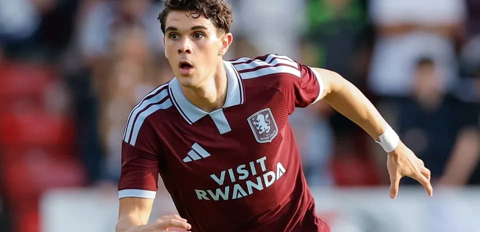 Aston Villa player running during a match