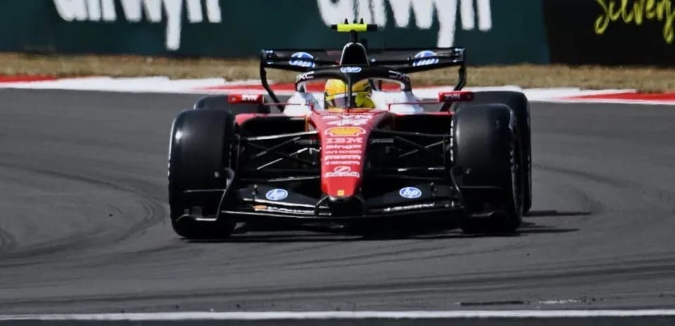 Formula 1 car navigating a turn on track