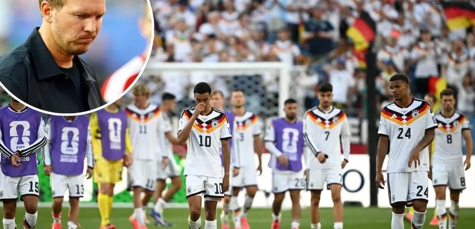 German team walking off the field after defeat