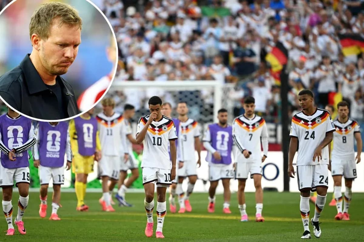 German team walking off the field after defeat