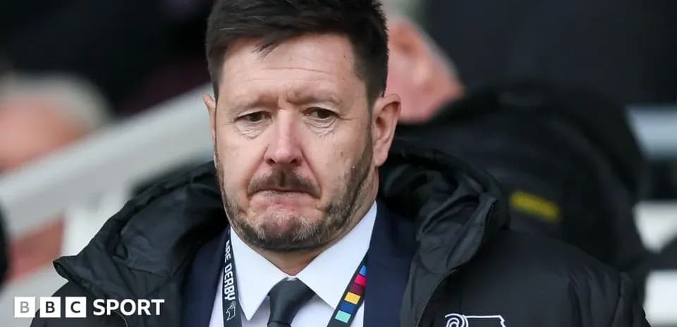 Manager observing the match from the sidelines