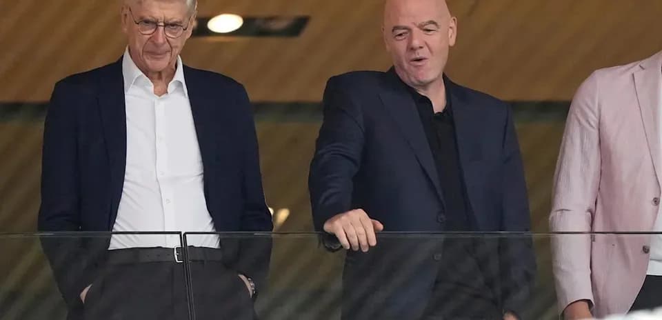 Two men conversing in a viewing box