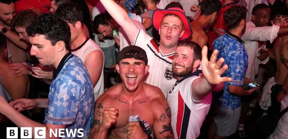 Fans celebrating at a lively event or party