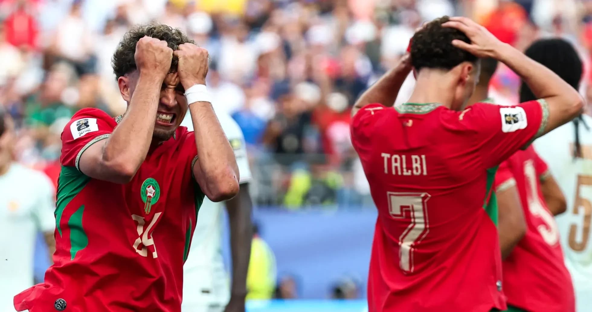 Moroccan players reacting during a tense match moment