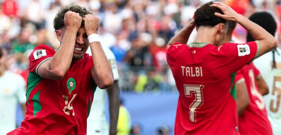 Moroccan players reacting during a tense match moment