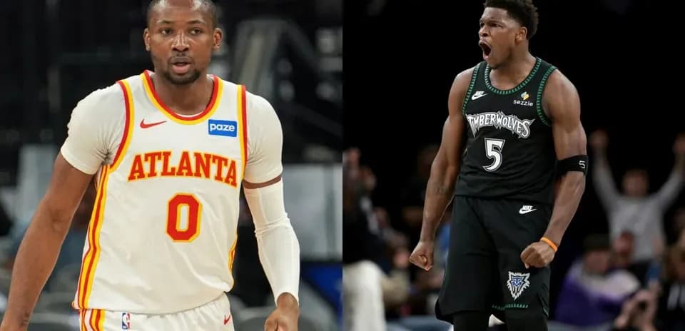 Two basketball players from different teams celebrating